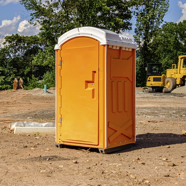 how often are the porta potties cleaned and serviced during a rental period in Adamsville Rhode Island